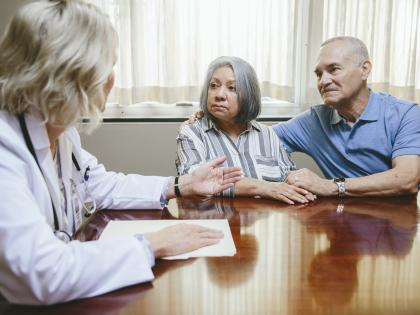 Doctor with senior couple